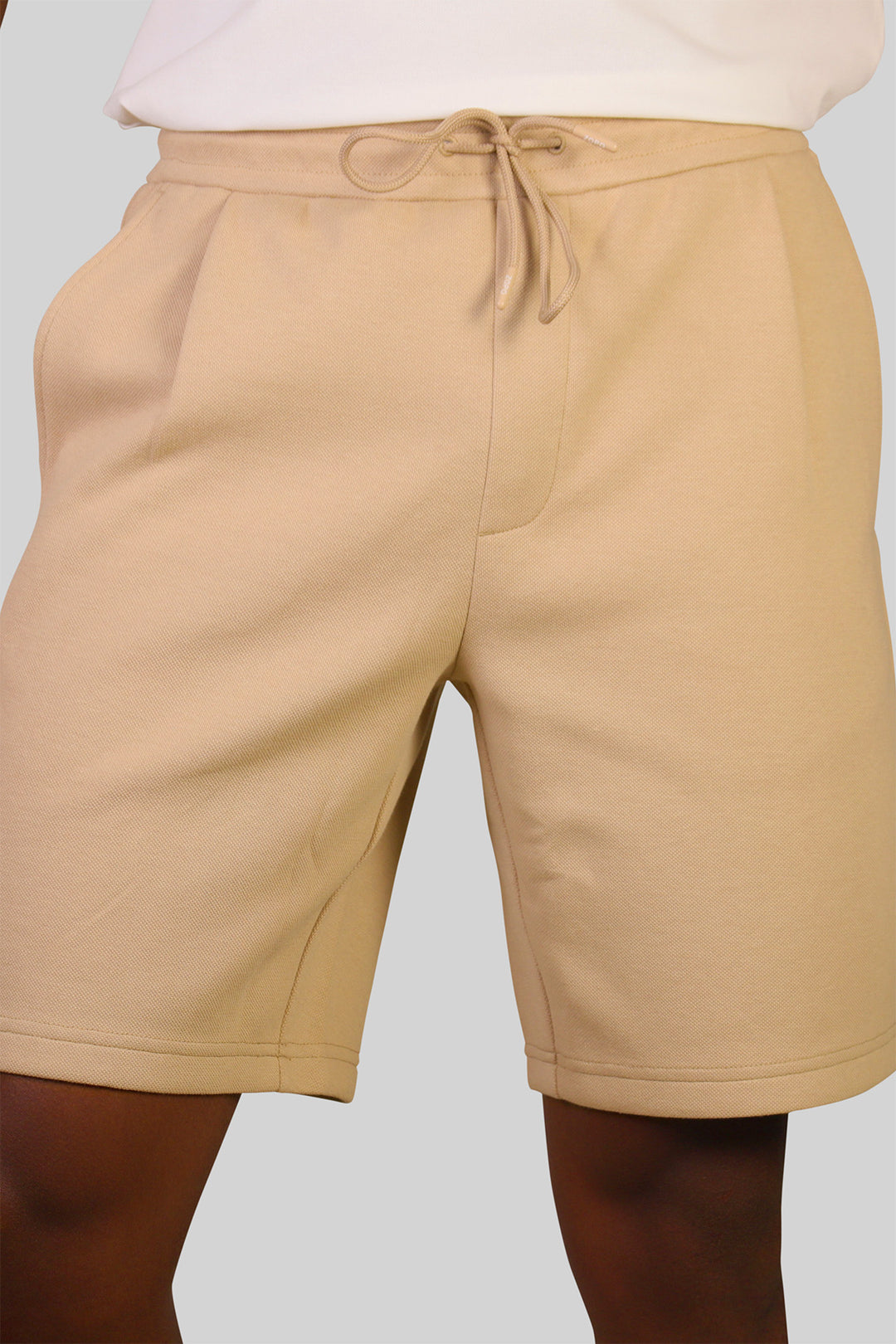 HOMEM-CALÇÃO BEGE DE MOLETOM NOVO