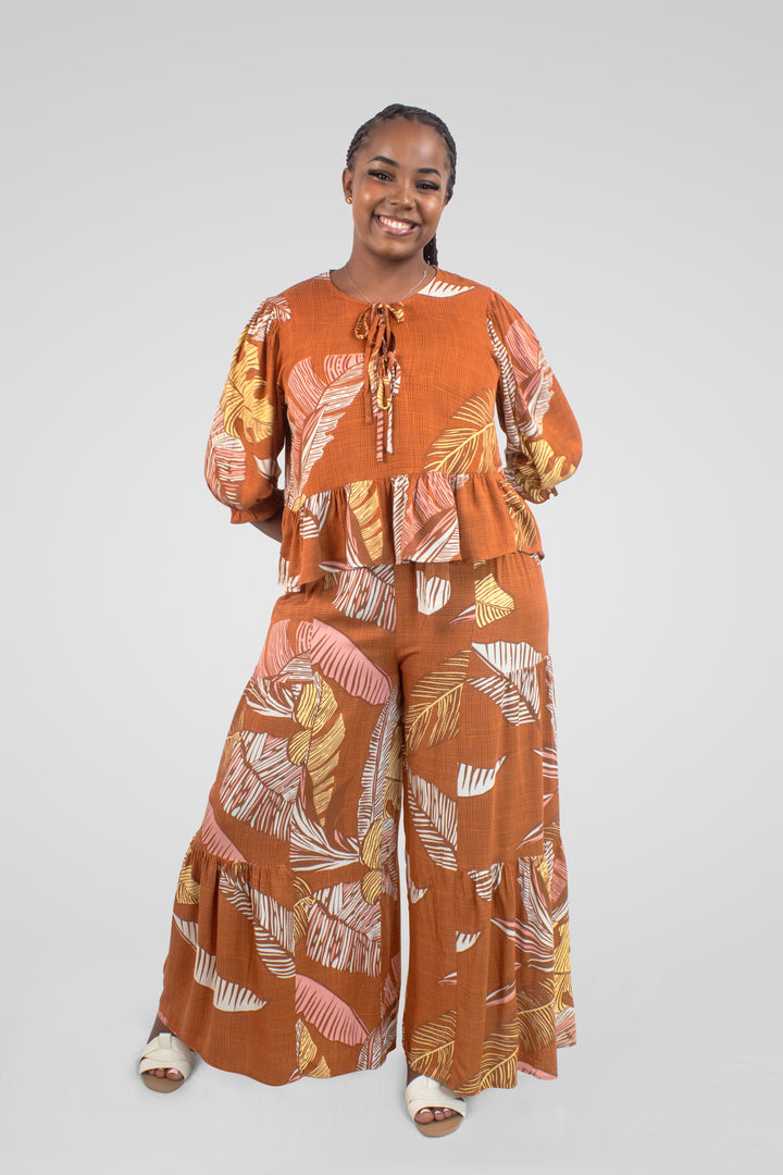 MULHER-CONJUNTO LARANJA COM ESTAMPAS NOVO