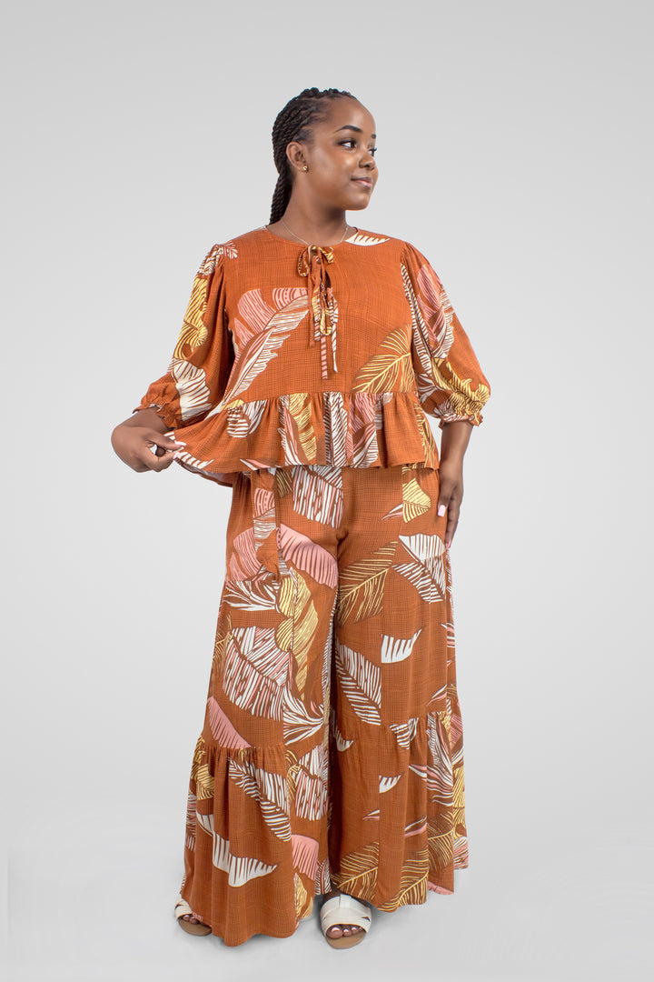 MULHER-CONJUNTO LARANJA COM ESTAMPAS NOVO