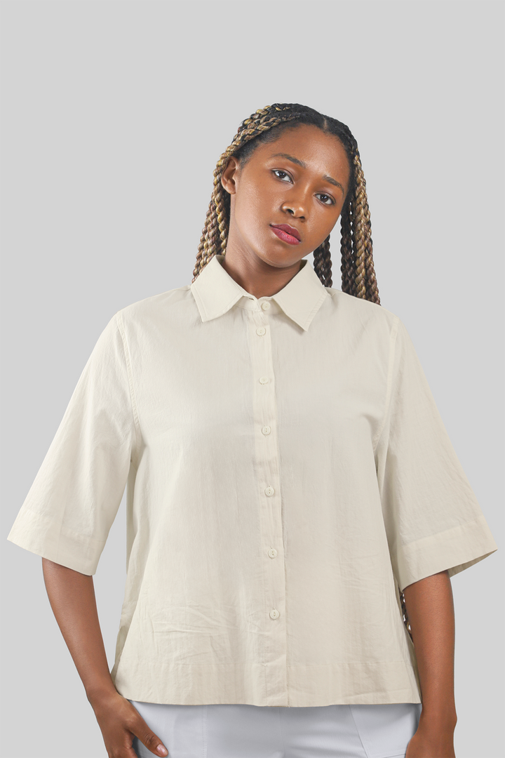 MULHER-CAMISA BEGE NOVA 2026