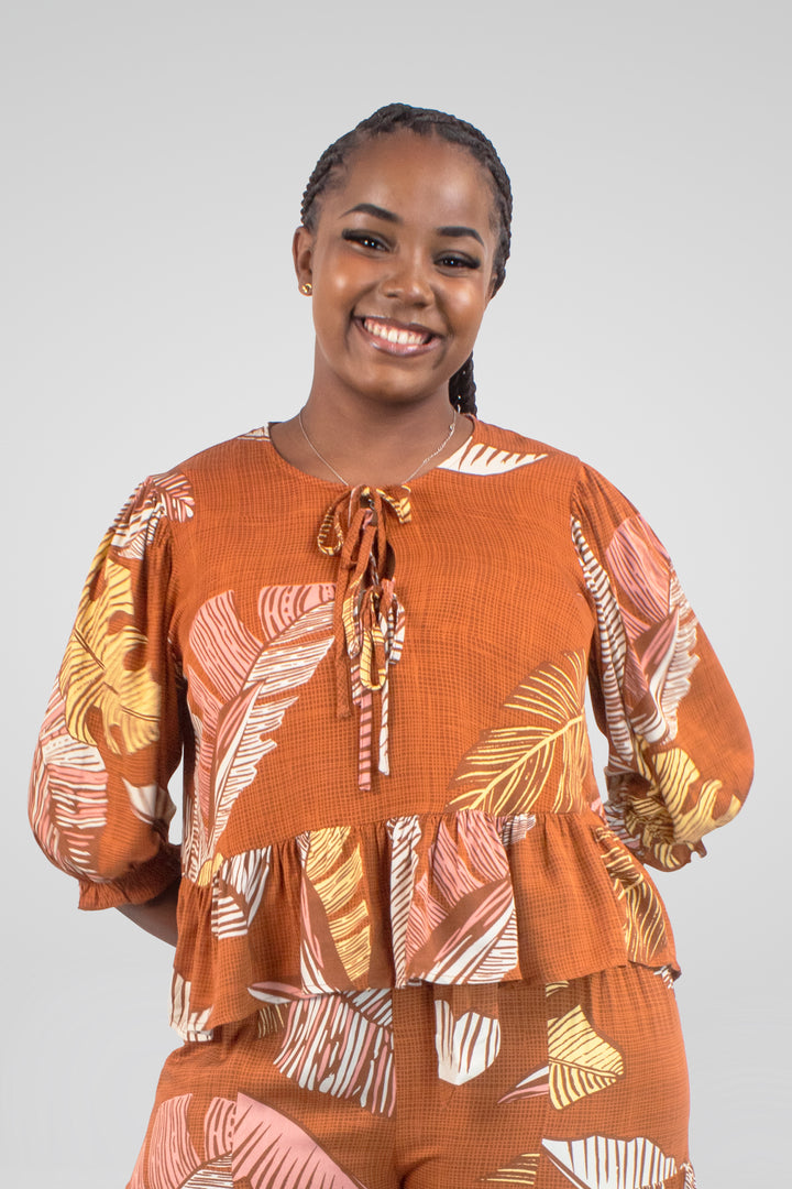 MULHER-CONJUNTO LARANJA COM ESTAMPAS NOVO