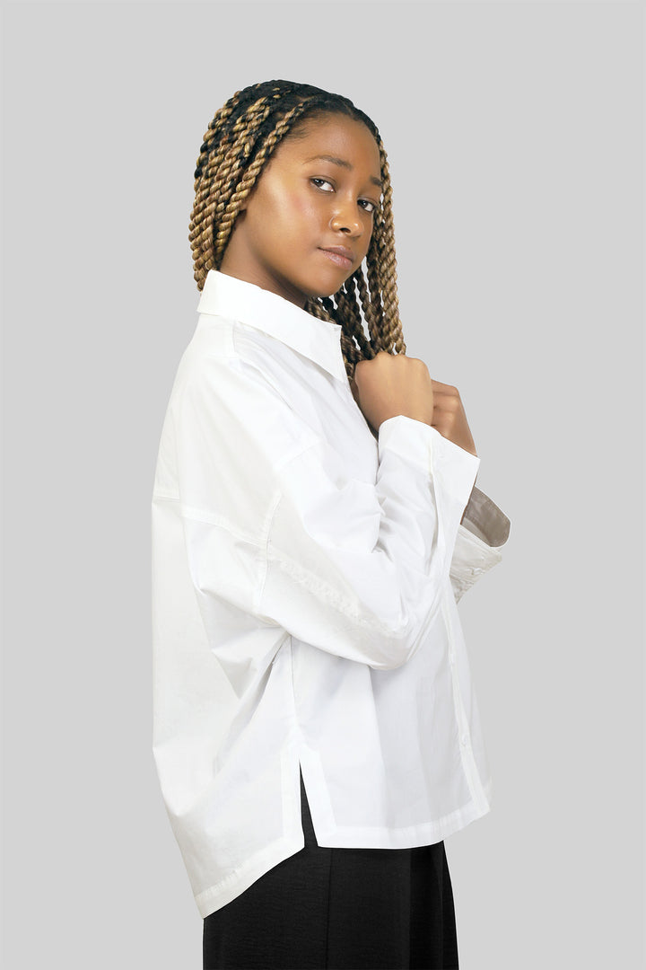 MULHER-CAMISA BRANCA NOVA 2026