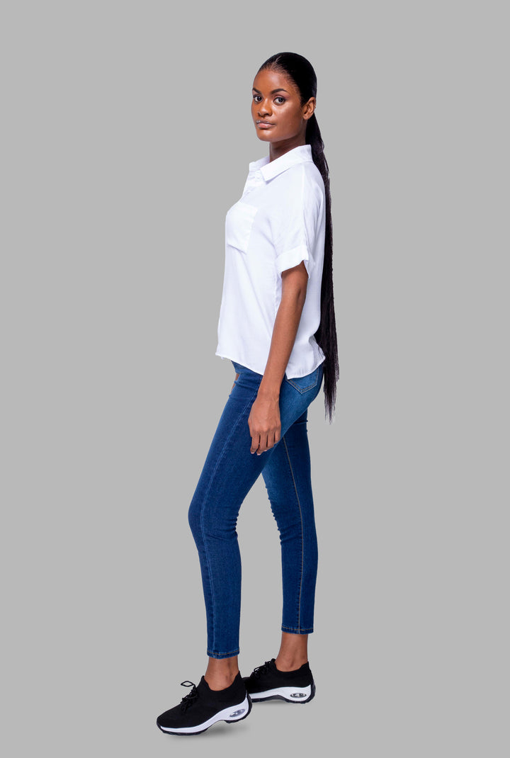MULHER-JEANS SLIM FIT ESCURA